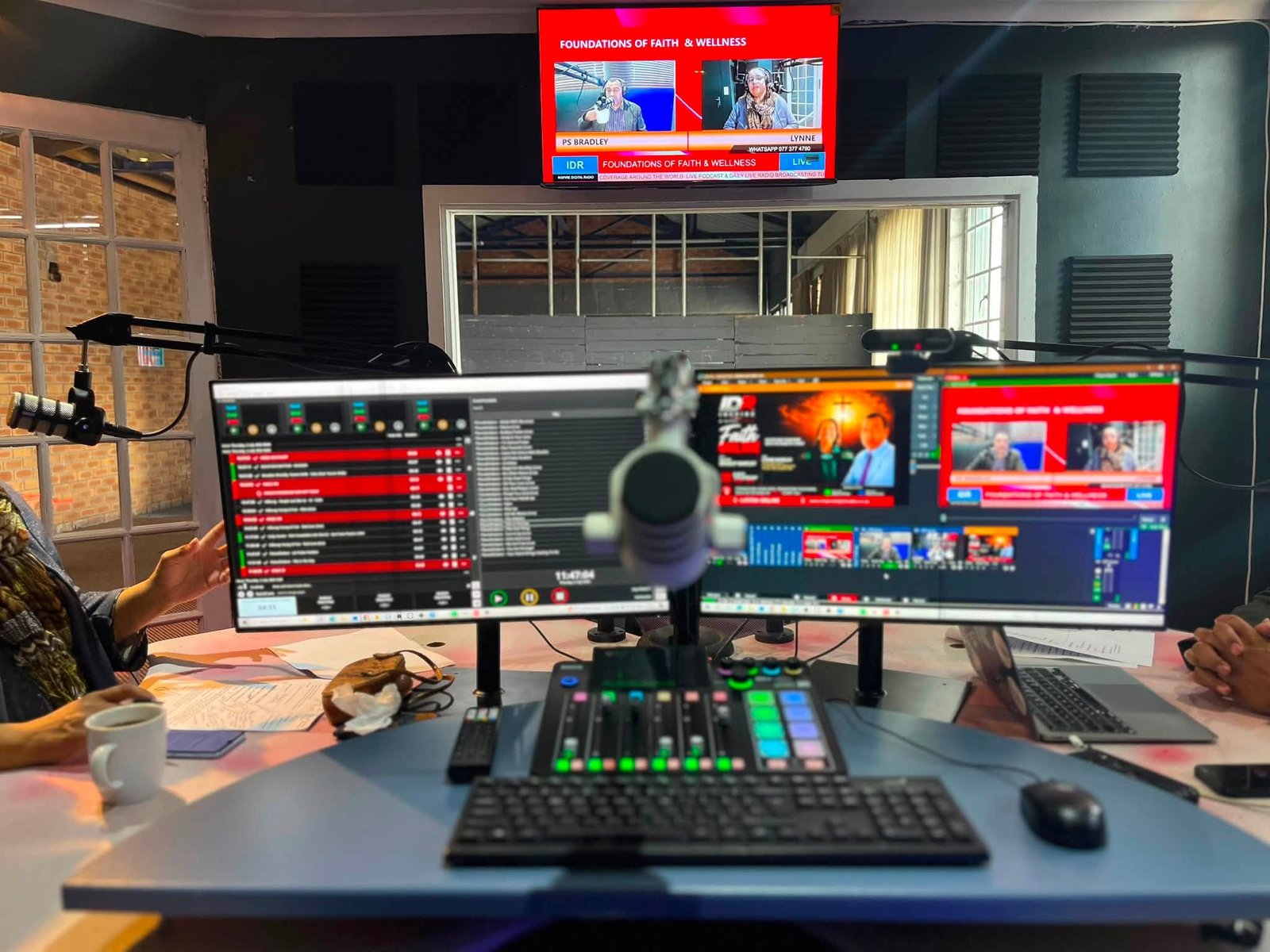 The multi-screen production desk running a live broadcast at Inspire Digital Radio